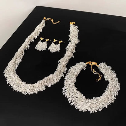 Ursa™ Earrings, Necklace, Bracelet with Cascade Tassels